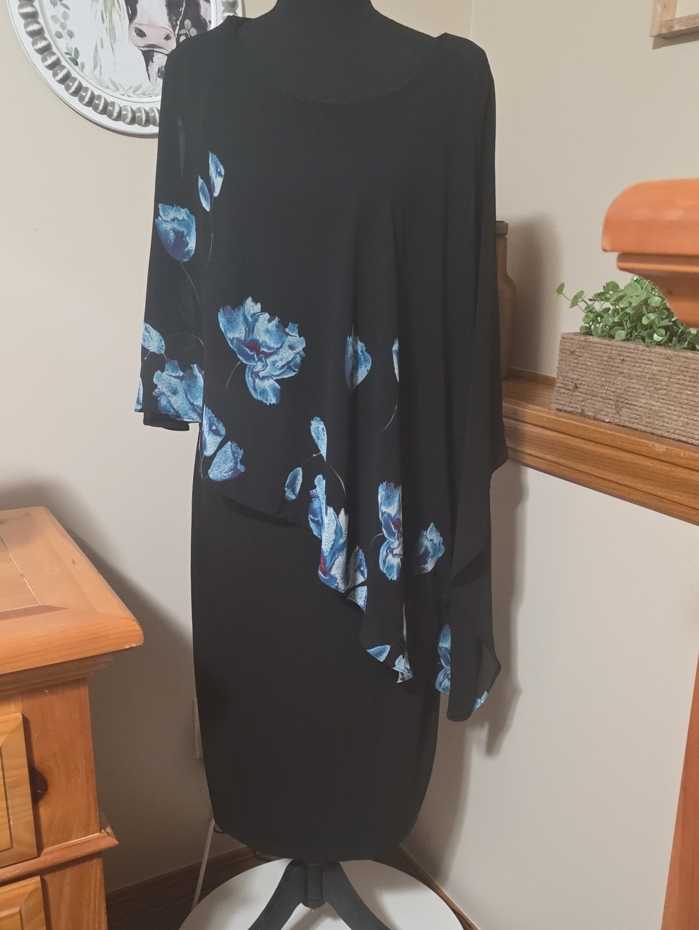 Elegant Black Midi Dress with Blue Floral Draped Overlay